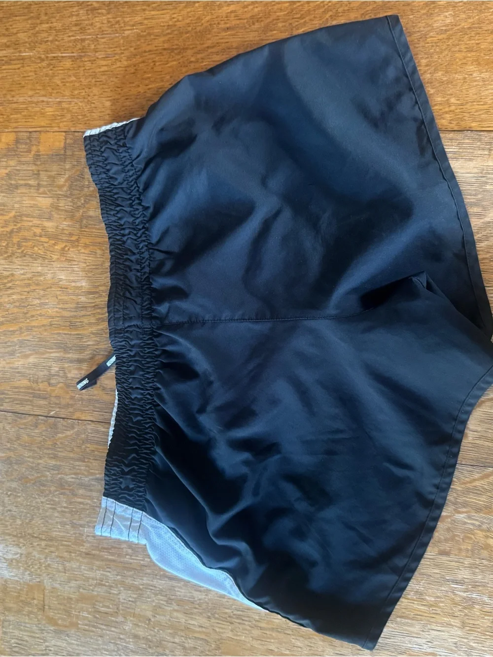 Nike Gray Athletic Shorts with White Swoosh